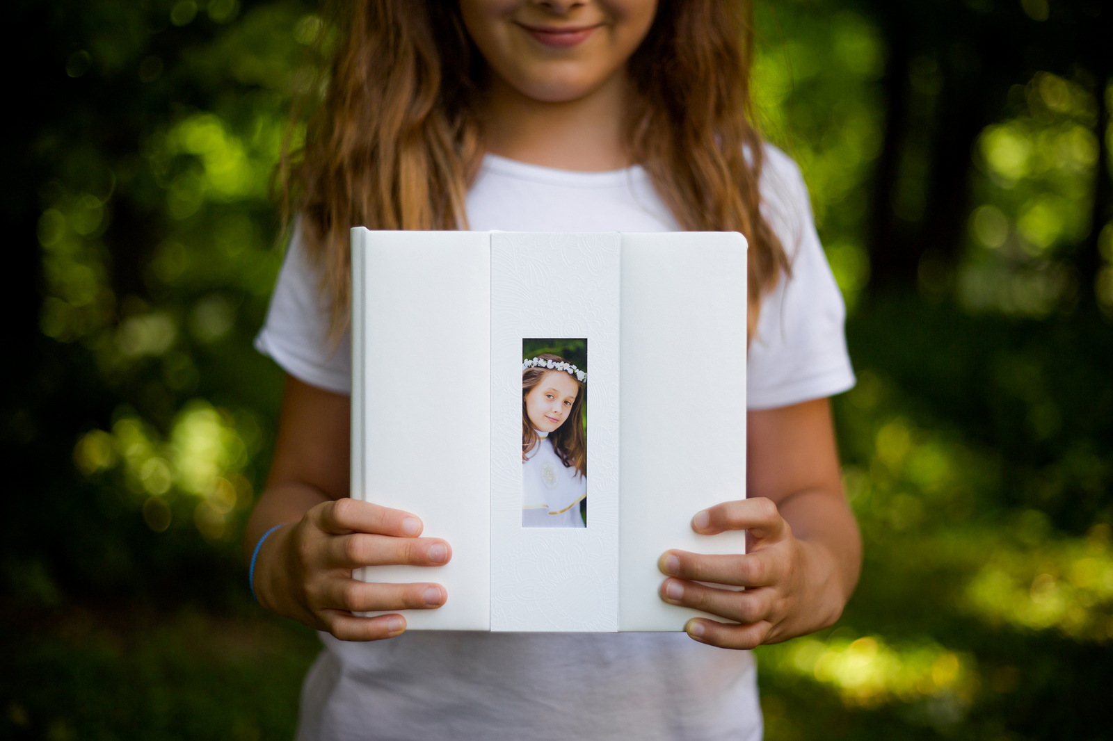 Fotoalbum z komunii - piękny album ze sztywnymi kartami w białej oprawie z ekoskóry