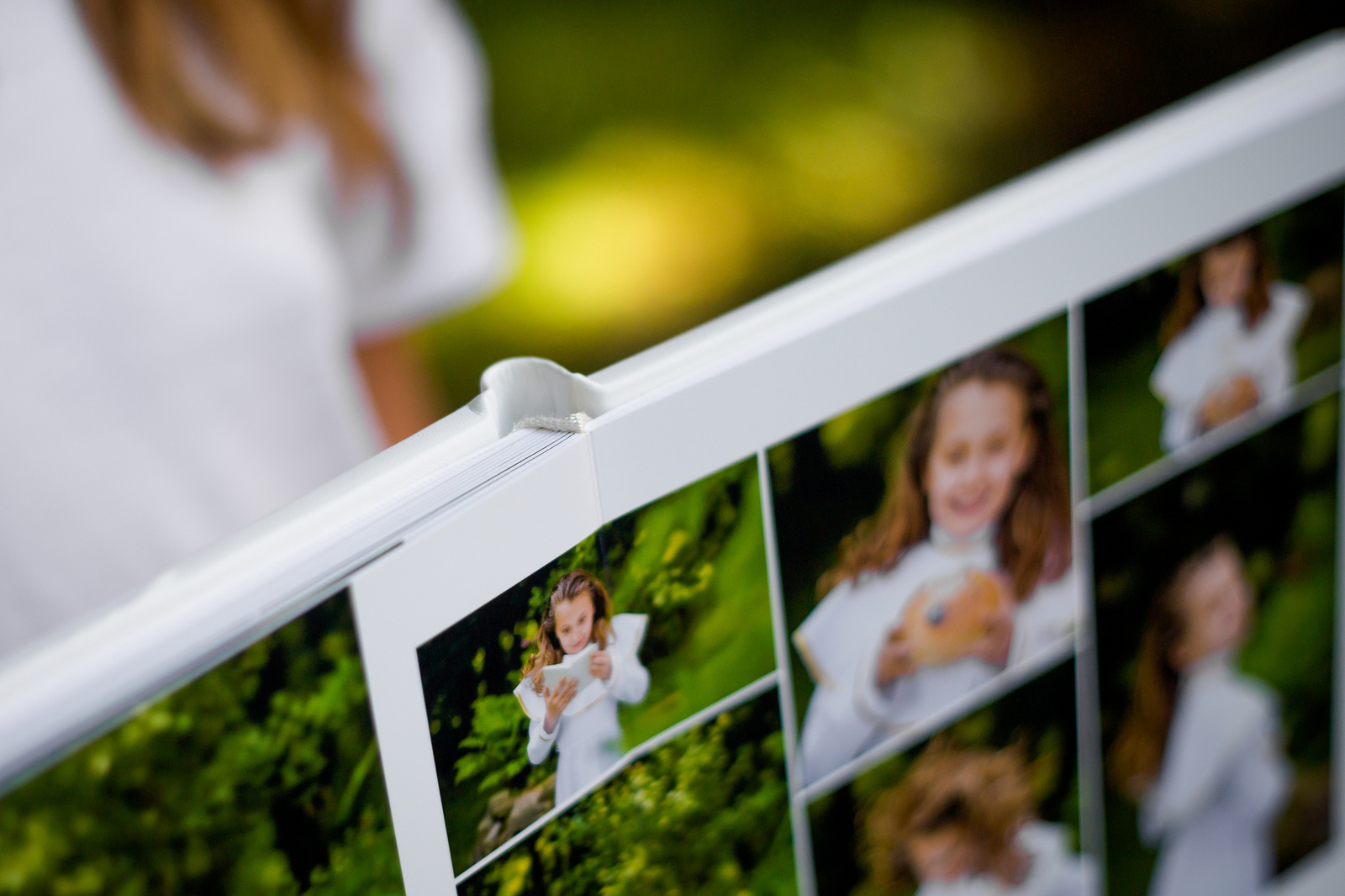 Fotoalbum z komunii - piękny album ze sztywnymi kartami w białej oprawie z ekoskóry